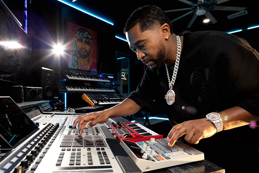 Zaytoven seated in his recording studio.